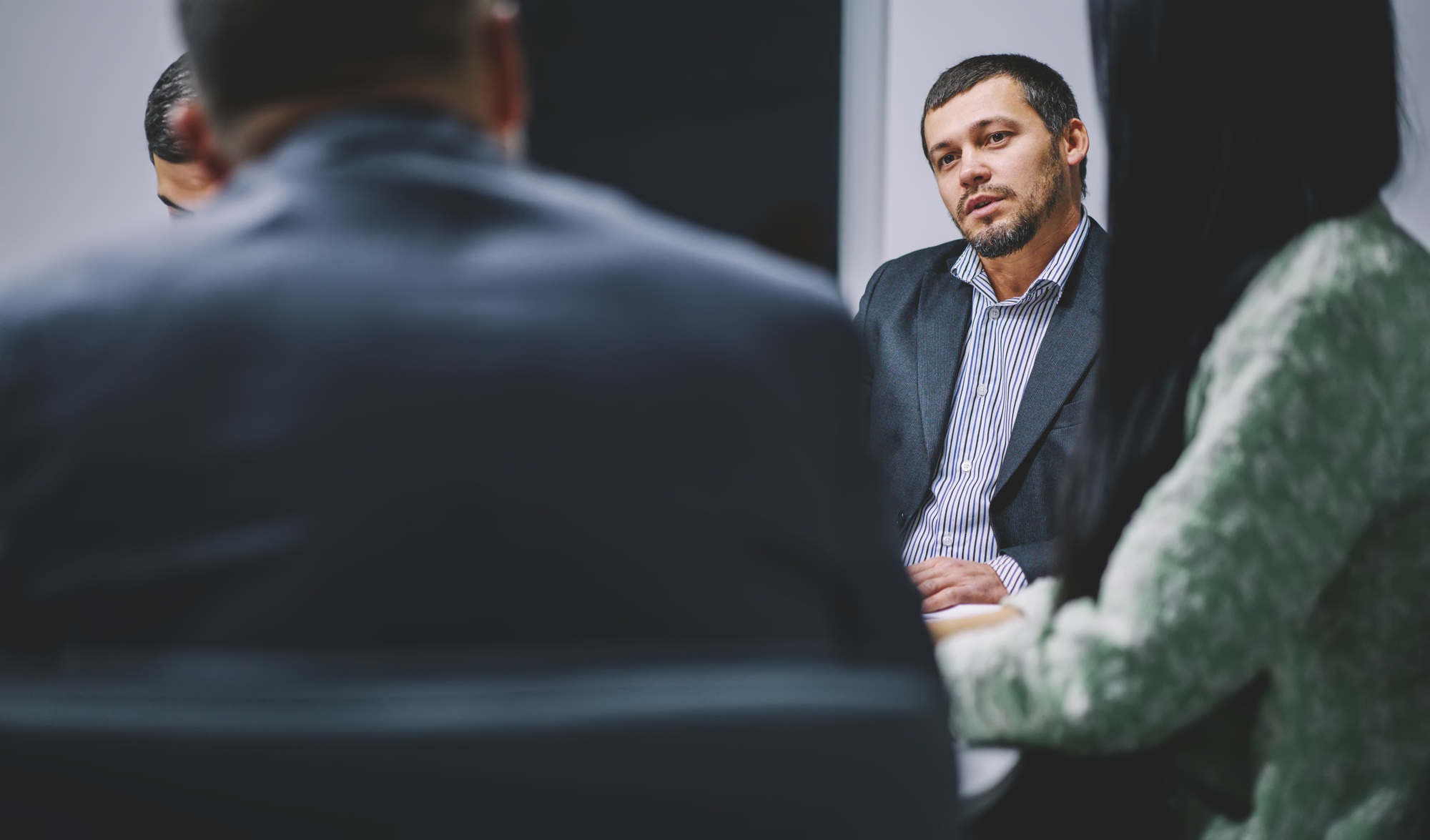 experienced owners in formal wear talking about competition and entrepreneurship in entreprise firm